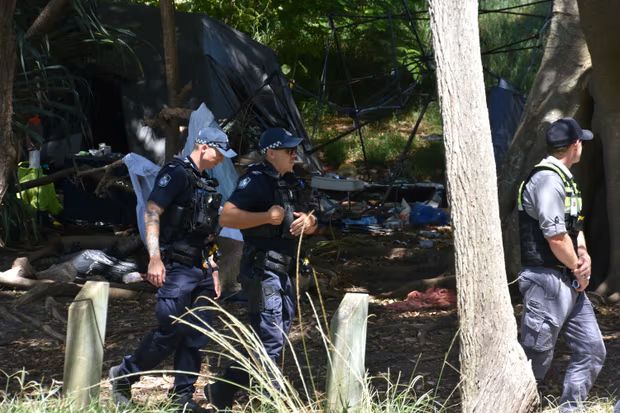 Police patrol a homeless encampment at Gayundah Arboretum Park, Redcliffe, on 12 February. Photo: Andrew Messenger, The Guardian