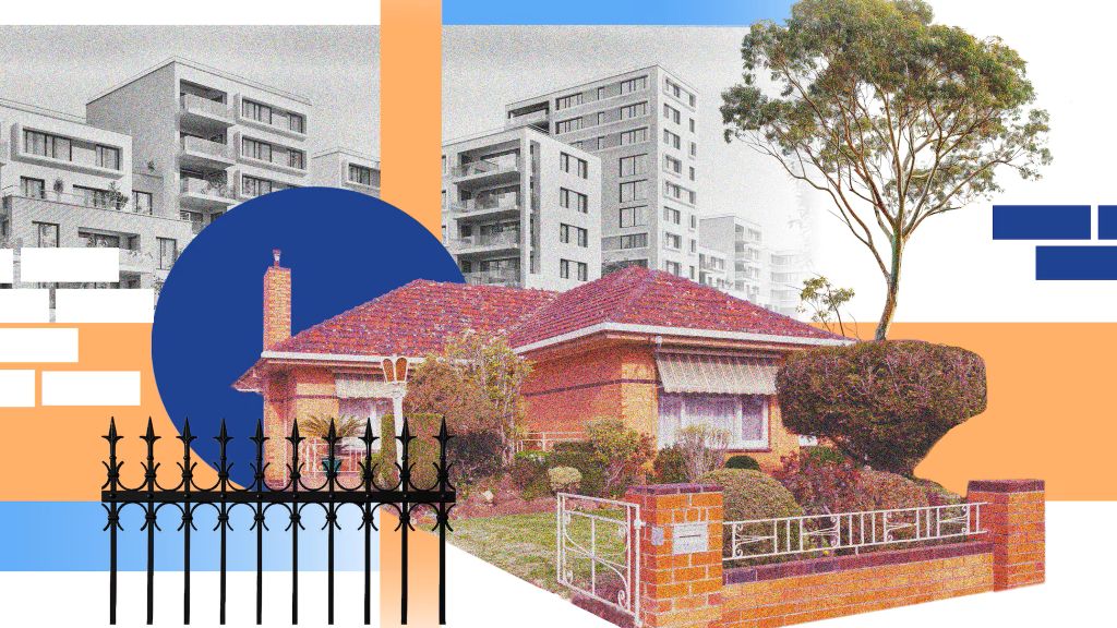 A suburban brick home with high rise apartments behind it